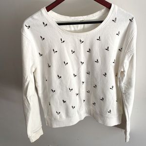 Garage. Creamy white long sleeved shirt. Small size but can run a little loose